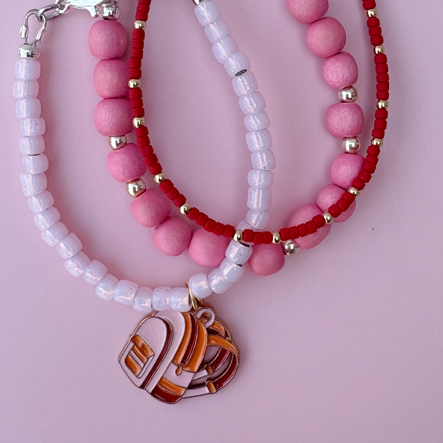 Blush *charm sold separately