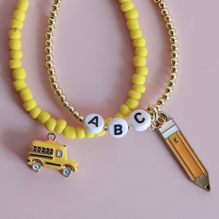School Bus Cutie Charm (18k gold pvd)