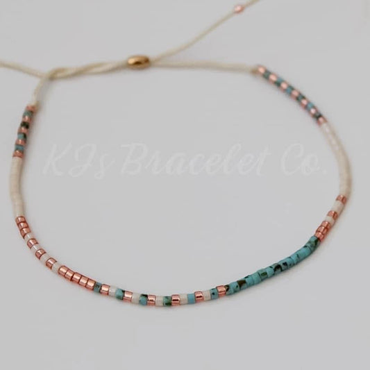 Turquoise, copper, cream slider